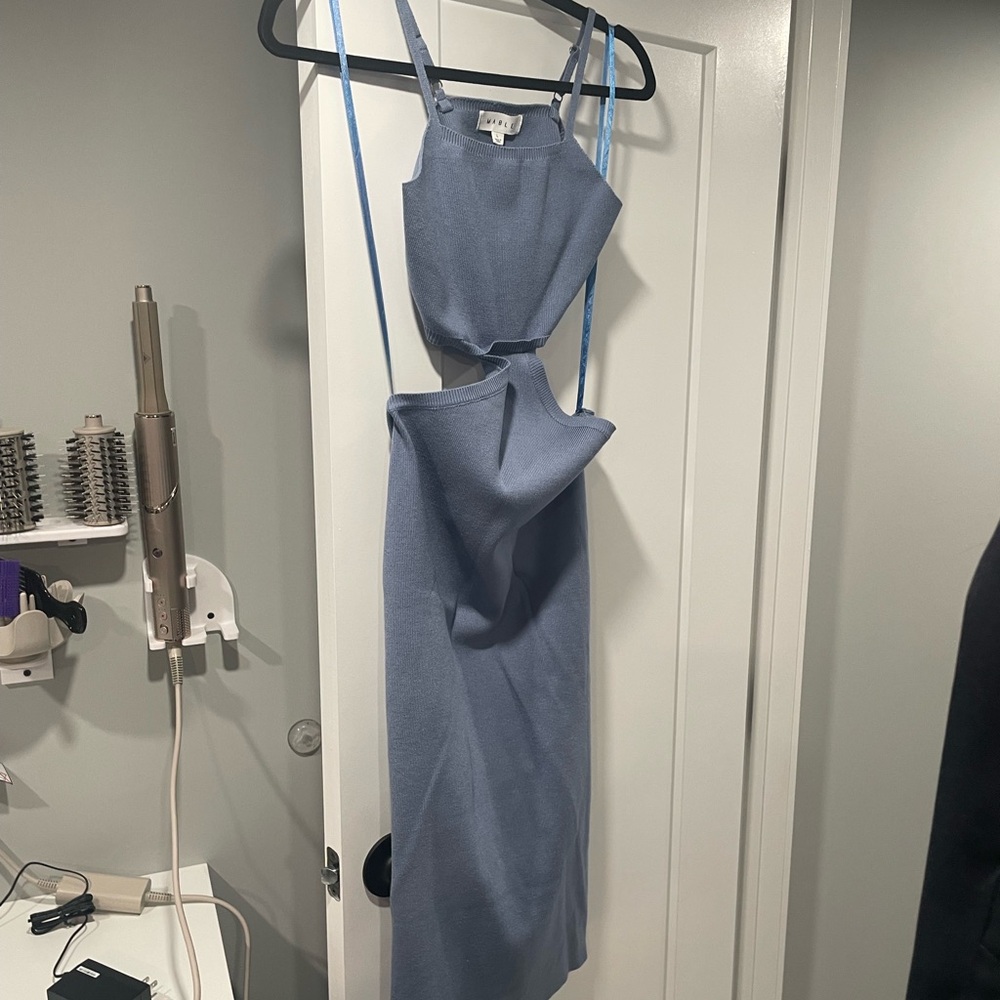 Cutout sweater dress. Open back